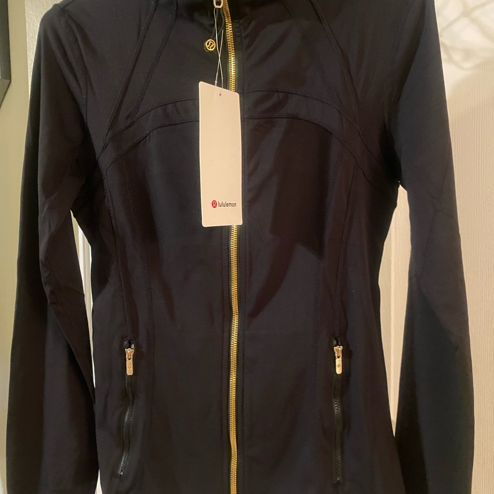 Define Lululemon black jacket Luon. Gold zippers. NWT.